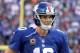 Sep 15, 2013; East Rutherford, NJ, USA; New York Giants quarterback Eli Manning (10) reacts to a Giants fumble against the Denver Broncos during the second quarter of a game at MetLife Stadium. Mandatory Credit: Brad Penner-USA TODAY Sports