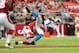 Sep 15, 2013; Phoenix, AZ, USA; Detroit Lions wide receiver Nate Burleson (13) is taken down by Arizona Cardinals safety Tyrann Mathieu (32) in the first quarter during a game against the Arizona Cardinals at University of Phoenix Stadium. Mandatory Credit: Jennifer Hilderbrand-USA TODAY Sports