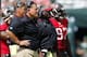 EAST RUTHERFORD, NJ - SEPTEMBER 8: Head coach Greg Schiano, left, of the Tampa Bay Buccaneers looks on during a game against the New York Jets at MetLife Stadium on September 8, 2013 in East Rutherford, New Jersey. (Photo by Rich Schultz /Getty Images)
