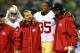SEATTLE, WA - SEPTEMBER 15: Eric Reid #35 of the San Francisco 49ers gets helped off the field after a play against the Seattle Seahawks during their game at Qwest Field on September 15, 2013 in Seattle, Washington. (Photo by Jonathan Ferrey/Getty Images)