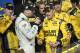 Sep 15, 2013; Joliet, IL, USA; NASCAR Sprint Cup Series driver Matt Kenseth (right) celebrates in victory lane with teammate Kyle Busch (left) after winning the Geico 400 at Chicagoland Speedway. Mandatory Credit: Rob Grabowski-USA TODAY Sports