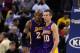 OAKLAND, CA - DECEMBER 22: Kobe Bryant #24 of the Los Angeles Lakers celebrates with Steve Nash #10 in the final seconds of overtime after they secured their victory over the Golden State Warriors at Oracle Arena on December 22, 2012 in Oakland, California. NOTE TO USER: User expressly acknowledges and agrees that, by downloading and or using this photograph, User is consenting to the terms and conditions of the Getty Images License Agreement. (Photo by Ezra Shaw/Getty Images)