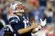 FOXBORO, MA - SEPTEMBER 12: Quarterback Tom Brady #12 of the New England Patriots reacts after an incomplete pass in the second quarter while taking on the New York Jets at Gillette Stadium on September 12, 2013 in Foxboro, Massachusetts. (Photo by Jim Rogash/Getty Images)