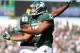 Sep 14, 2013; East Lansing, MI, USA; Michigan State Spartans wide receiver Bennie Fowler (13) and defensive end Shilique Calhoun (89) celebrate a touchdown during the first half in a game against the Youngstown State Penguins at Spartan Stadium. Mandatory Credit: Mike Carter-USA TODAY Sports