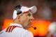 LINCOLN, NE - SEPTEMBER 7: Nebraska Cornhuskers head coach Bo Pelini eyes the clock as his offense runs out the remaining minutes of their game against the Southern Miss Golden Eagles at Memorial Stadium on September 7, 2013 in Lincoln, Nebraska. Nebraska defeated Southern Miss 56-13. (Photo by Eric Francis/Getty Images)