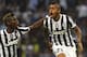 MILAN, ITALY - SEPTEMBER 14: Arturo Vidal (R) of Juventus FC celebrates his goal with team-mate Paul Pogba (L) during the Serie A match between FC Internazionale Milano and Juventus FC at San Siro Stadium on September 14, 2013 in Milan, Italy. (Photo by Marco Luzzani/Getty Images)