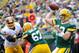Sep 15, 2013; Green Bay, WI, USA; Green Bay Packers quarterback Aaron Rodgers grets a pass away in the fourth quarter during the game against the Washington Redskins at Lambeau Field. Mandatory Credit: Benny Sieu-USA TODAY Sports