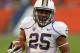 CHICAGO, IL - SEPTEMBER 14: Bishop Sankey #25 of the Washington Huskies runs for a touchdown against the Illinois Fighting Illini at Soldier Field on September 14, 2013 in Chicago, Illinois. (Photo by Jonathan Daniel/Getty Images)