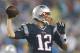 FOXBORO, MA - SEPTEMBER 12: Tom Brady #12 of the New England Patriots throws a pass in the rain in the third quarter against the New York Jets during the game at Gillette Stadium on September 12, 2013 in Foxboro, Massachusetts. (Photo by Jared Wickerham/Getty Images)