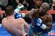 LAS VEGAS, NV - SEPTEMBER 14: Floyd Mayweather Jr. (R) hits Canelo Alvarez in the seventh round of their WBC/WBA 154-pound title fight at the MGM Grand Garden Arena on September 14, 2013 in Las Vegas, Nevada. Mayweather won by majority decision. (Photo by Ethan Miller/Getty Images)