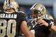 TAMPA, FL - SEPTEMBER 15: Quarterback Drew Brees #9 of the New Orleans Saints celebrates after a touchdown pass to tight end Jimmy Graham #80 against the Tampa Bay Buccaneers September 15, 2013 at Raymond James Stadium in Tampa, Florida. (Photo by Al Messerschmidt/Getty Images)