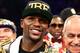 LAS VEGAS, NV - SEPTEMBER 14: Floyd Mayweather Jr. celebrates his majority decision victory against Canelo Alvarez in their WBC/WBA 154-pound title fight at the MGM Grand Garden Arena on September 14, 2013 in Las Vegas, Nevada. (Photo by Al Bello/Getty Images)