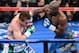 LAS VEGAS, NV - SEPTEMBER 14: Floyd Mayweather Jr. (R) hits Canelo Alvarez in the fifth round of their WBC/WBA 154-pound title fight at the MGM Grand Garden Arena on September 14, 2013 in Las Vegas, Nevada. Mayweather won by majority decision. (Photo by Ethan Miller/Getty Images)
