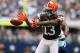 Nov 18, 2012; Arlington, TX, USA; Cleveland Browns receiver Josh Gordon (13) can not make a reception against Dallas Cowboys cornerback Orlando Scandrick (32) in the second quarter at Cowboys Stadium. Mandatory Credit: Matthew Emmons-USA TODAY Sports