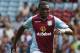 BIRMINGHAM, ENGLAND - AUGUST 10: Jores Okore of Aston Villa runs with the ball during a Pre Season Friendly between Aston Villa and Malaga at Villa Park on August 10, 2013 in Birmingham, England. (Photo by David Rogers/Getty Images)