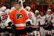 PHILADELPHIA, PA - SEPTEMBER 16: Chris Vande Velde #76 of the Philadelphia Flyers reacts to the loss as the Washington Capitals celebrate at Wells Fargo Center on September 16, 2013 in Philadelphia, Pennsylvania. The Washington Capitals defeated the Philadelphia Flyers 4-3 in an overtime shootout. (Photo by Elsa/Getty Images)