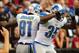 Sep 15, 2013; Phoenix, AZ, USA; Detroit Lions wide receiver Calvin Johnson (81) celebrates with teammate running back Joique Bell after a touchdown in the second quarter against the Arizona Cardinals at University of Phoenix Stadium. Mandatory Credit: Jennifer Hilderbrand-USA TODAY Sports