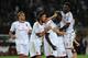 TURIN, ITALY - SEPTEMBER 14: Mario Balotelli (3nd R) of AC Milan celebrates with his team mates after scoring during the Serie A match between Torino FC and AC Milan at Stadio Olimpico di Torino on September 14, 2013 in Turin, Italy. (Photo by Valerio Pennicino/Getty Images)
