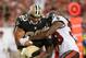 Sep 15, 2013; Tampa, FL, USA; Tampa Bay Buccaneers free safety Dashon Goldson (38) defends New Orleans Saints tight end Jimmy Graham (80) during the game at Raymond James Stadium. Mandatory Credit: Rob Foldy-USA TODAY Sports