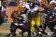 Sep 16, 2013; Cincinnati, OH, USA; Pittsburgh Steelers running back Felix Jones (23) is wrapped up by Cincinnati Bengals defensive end Wallace Gilberry (95) at Paul Brown Stadium. Mandatory Credit: Greg Bartram-USA TODAY Sports