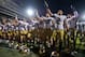 Sep 14, 2013; West Lafayette, IN, USA; Notre Dame Fighting Irish cornerback Bennett Jackson (2) and linebacker Jarrett Grace (59) celebrate with their teammates after Notre Dame defeated the Purdue Boilermakers 31-24 at Ross-Ade Stadium. Mandatory Credit: Matt Cashore-USA TODAY Sports