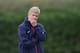 ST ALBANS, ENGLAND - SEPTEMBER 17: Arsene Wenger of Arsenal looks on during an Arsenal training session at London Colney on September 17, 2013 in St Albans, England. (Photo by Jamie McDonald/Getty Images)
