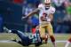 SEATTLE, WA - SEPTEMBER 15: Quarterback Colin Kaepernick #7 of the San Francisco 49ers rushes against the Seattle Seahawks at CenturyLink Field on September 15, 2013 in Seattle, Washington. (Photo by Otto Greule Jr/Getty Images)