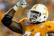 August 31, 2012; Atlanta, GA, USA; Tennessee Volunteers offensive linesman Antonio Richardson (74) celebrates in the second half against the North Carolina State Wolfpack at the Georgia Dome. Tennessee beat NC State 35-21. Mandatory Credit: Daniel Shirey-USA TODAY Sports