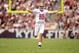 Sep 14, 2013; College Station, TX, USA; Alabama Crimson Tide quarterback A.J. McCarron (10) celebrates throwing a touchdown against the Texas A&M Aggies during the first half at Kyle Field. Mandatory Credit: Thomas Campbell-USA TODAY Sports