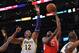 November 18, 2012; Los Angeles, CA, USA; Los Angeles Lakers center Dwight Howard (12) looks on as Houston Rockets shooting guard James Harden (13) scores in the first half at the Staples Center. Mandatory Credit: Jayne Kamin-Oncea-USA TODAY Sports