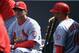DENVER, CO - SEPTEMBER 19: Manager Mike Matheny #22 of the St. Louis Cardinals and third base coach Jose Oquendo #11 of the St. Louis Cardinals talk in the dugout as they face the Colorado Rockies at Coors Field on September 19, 2013 in Denver, Colorado. (Photo by Doug Pensinger/Getty Images)