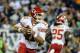 Sep 19, 2013; Philadelphia, PA, USA; Kansas City Chiefs quarterback Alex Smith (11) rolls out and looks for a receiver during the second quarter of the game against the Philadelphia Eagles at Lincoln Financial Field. Mandatory Credit: John Geliebter-USA TODAY Sports