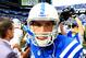 Sep 15, 2013; Indianapolis, IN, USA; Indianapolis Colts quarterback Andrew Luck (12) walks off the field after being defeated by Miami Dolphins 24-20 at Lucas Oil Stadium. Mandatory Credit: Andrew Weber-USA TODAY Sports
