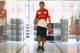 SINGAPORE - SEPTEMBER 19: Fernando Alonso of Spain and Ferrari walks out of the team garage during previews for the Singapore Formula One Grand Prix at Marina Bay Street Circuit on September 19, 2013 in Singapore, Singapore. (Photo by Paul Gilham/Getty Images)