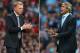 (FILE PHOTO - EDITORS NOTE: COMPOSITE OF TWO IMAGES - Image Numbers (left) 177990986 and 176924376 ) In this composite image a comparison has been made between David Moyes (L) , Manager of Manchester United and Manuel Pellegrini,Manager of Manchester City. Manchester City and Manchester United meet for the first Manchester Derby of the season on September 22, 2013 at the Etihad Stadium, Manchester. ***LEFT IMAGE*** MANCHESTER, ENGLAND - AUGUST 26: Manchester United Manager David Moyes applauds during the Barclays Premier League match between Manchester United and Chelsea at Old Trafford on August 26, 2013 in Manchester, England. (Photo by Alex Livesey/Getty Images) ***RIGHT IMAGE*** MANCHESTER, ENGLAND - AUGUST 19: Manuel Pellegrini the manager of Manchester City shouts instructions during the Barclays Premier League match between Manchester City and Newcastle United at the Etihad Stadium on August 19, 2013 in Manchester, England. (Photo by Alex Livesey/Getty Images)