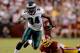 LANDOVER, MD - SEPTEMBER 09: Running back Bryce Brown #34 of the Philadelphia Eagles runs the ball in the first half against nose tackle Barry Cofield #96 of the Washington Redskins at FedExField on September 9, 2013 in Landover, Maryland. (Photo by Patrick Smith/Getty Images)