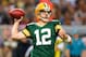 Oct 21, 2012; St. Louis, MO, USA; Green Bay Packers quarterback Aaron Rodgers (12) looks to pass the ball against the St. Louis Rams during the first half at Edward Jones Dome. Mandatory Credit: Scott Kane-USA TODAY Sports