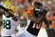 Aug 23, 2012; Cincinnati, OH, USA; Green Bay Packers defensive back Tramon Williams (38) breaks up a fade pattern to Cincinnati Bengals wide receiver AJ Green (18) during the pre-season game at Paul Brown Stadium. Mandatory Credit: Rob Leifheit-USA TODAY Sports