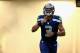 SEATTLE, WA - SEPTEMBER 15: Russell Wilson #3 of the Seattle Seahawks runs on the field prior to their game against the San Francisco 49ers at Qwest Field on September 15, 2013 in Seattle, Washington. (Photo by Jonathan Ferrey/Getty Images)