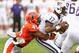 CHICAGO, IL - SEPTEMBER 14: Jonathan Brown #45 of the Illinois Fighting Illini sacks Keith price #17 of the Washington Huskies at Soldier Field on September 14, 2013 in Chicago, Illinois. (Photo by Jonathan Daniel/Getty Images)
