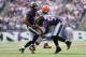 BALTIMORE, MD - SEPTEMBER 15: Daryl Smith #51 and Josh Bynes #56 of the Baltimore Ravens tackle running back Trent Richardson #33 of the Cleveland Browns during the second half at M&T Bank Stadium on September 15, 2013 in Baltimore, Maryland. (Photo by Rob Carr/Getty Images)