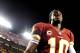 LANDOVER, MD - SEPTEMBER 09: Quarterback Robert Griffin III #10 of the Washington Redskins walks off the field after losing to the Philadelphia Eagles at FedExField on September 9, 2013 in Landover, Maryland. The Philadelphia Eagles won, 33-27. (Photo by Patrick Smith/Getty Images)