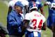 May 11, 2012; East Rutherford, NJ, USA; New York Giants first round draft pick running back David Wilson (34) speaks with head coach Tom Coughlin during minicamp at the Timex Performance Center. Mandatory Credit: Debby Wong-USA TODAY Sports