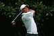 ATLANTA, GA - SEPTEMBER 21: Tiger Woods hits his tee shot on the fourth hole during the third round of the Tour Championship by Coca-Cola at East Lake Golf Club on September 21, 2013 in Atlanta, Georgia. (Photo by Sam Greenwood/Getty Images)