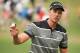 Sep 21, 2013; Atlanta, GA, USA; Henrik Stenson acknowledges the crowd after making birdie on the second hole during the third round of the Tour Championship at East Lake Golf Club. Mandatory Credit: Kevin Liles-USA TODAY Sports