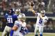 ARLINGTON, TX - SEPTEMBER 8: Tony Romo #9 of the Dallas Cowboys throws a pass during a game against the New York Giants at AT&T Stadium on September 8, 2013 in Arlington, Texas. (Photo by Wesley Hitt/Getty Images)