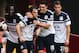 LONDON, ENGLAND - SEPTEMBER 21: Leighton Baines (2nd left) of Everton celebrates with team mates after scoring during the Barclays Premier League match between West Ham United and Everton at the Boleyn Ground on September 21, 2013 in London, England. (Photo by Ian Walton/Getty Images)