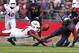 PISCATAWAY, NJ - SEPTEMBER 21: Line backer Braylon Mitchell #34 of the Arkansas Razorbacks is called for pass interference while defending wide receiver Quron Pratt #7 of the Rutgers Scarlet Knights during the first half in a game at High Point Solutions Stadium on September 21, 2013 in Piscataway, New Jersey. (Photo by Rich Schultz /Getty Images)