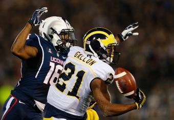 Michigan insists on going to Gallon, who's been covered all night by UConn.