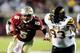 TALLAHASSEE, FL - SEPTEMBER 21: Rakeem Knight #93 of the Bethune-Cookman Wildcats pursues Jameis Winston #5 of the Florida State Seminoles during a game at Doak Campbell Stadium on September 21, 2013 in Tallahassee, Florida. (Photo by Stacy Revere/Getty Images)